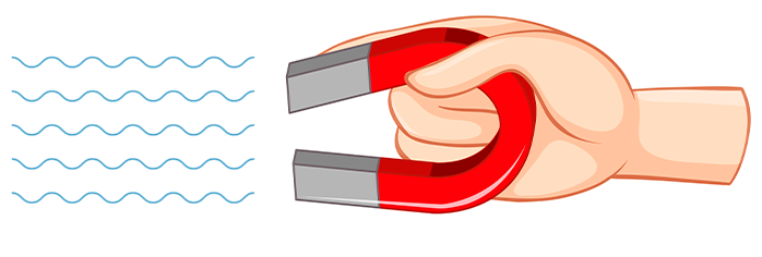 mano tiene un iman para explicar electricidad y magnetismo
